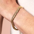 Close Up Model Shot of Gold Stainless Steel Chunky Triple Snake Chain Bracelet