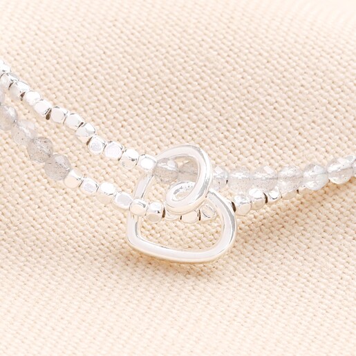 Close up of the doodle heart charm and dual layer of beads in silver