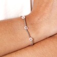 Close Up of Stainless Steel Pink Daisy Beaded Bracelet in Silver on Model