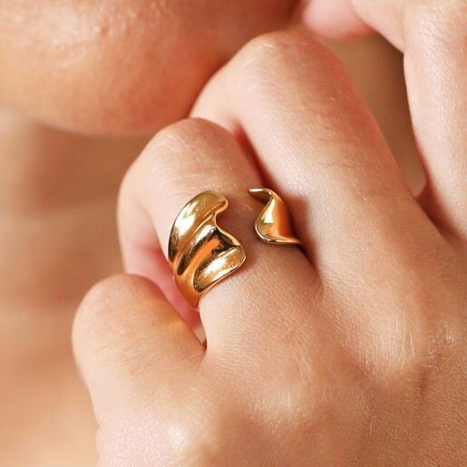 Close Up on Model Close Up of Stainless Steel Open Wave Adjustable Ring in Gold on Model