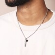 Close Up of Men's Feather and Semi-Precious Stone Pendant Necklace on Model