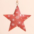 Close Up of Patterned Red Star Hanging Decoration