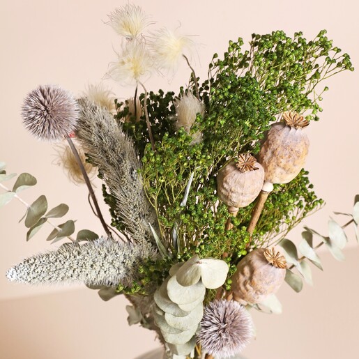 Close up of flowers in the Eucalyptus and Thistle Dried Flower Bouquet