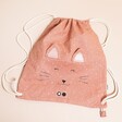 Dusky Pink Cotton Bag With a Smiling Cat Face on a Neutral Background