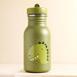 Trixie Mr. Dino Water Bottle 350ml on a Beige Background