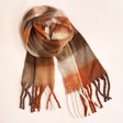 Brown Check Winter Scarf on a Beige Background