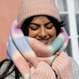 Close Up of Pastel Stripe Cream Winter Scarf on Model