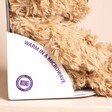 Warmies Junior Brown Curly Bear Microwavable Soft Toy in the box with side view on a neutral background