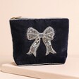 My Doris Silver Bow Small Pouch on Neutral Background