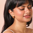 Molten Heart Half Hoop Earrings in Gold on Model 