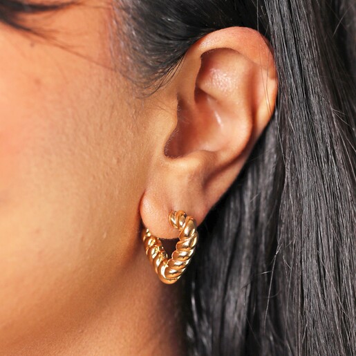 Earrings on Model Close Up of Twisted Rope Creole Heart Hoop Earrings In Gold on Model