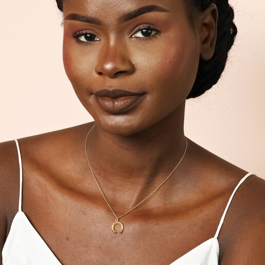 Model Wearing Stainless Steel Horseshoe Pendant Necklace in Gold