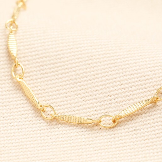 Close up of Fish Chain Necklace in Gold