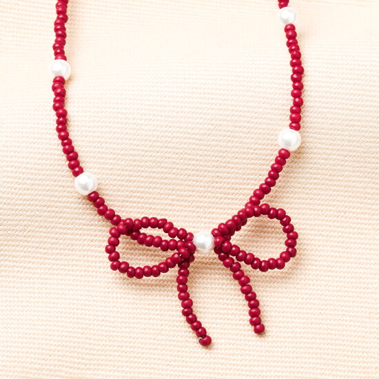 Pearl and Red Beaded Bow Pendant Necklace