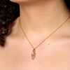 Stainless Steel Hamsa Hand Necklace in Gold on model