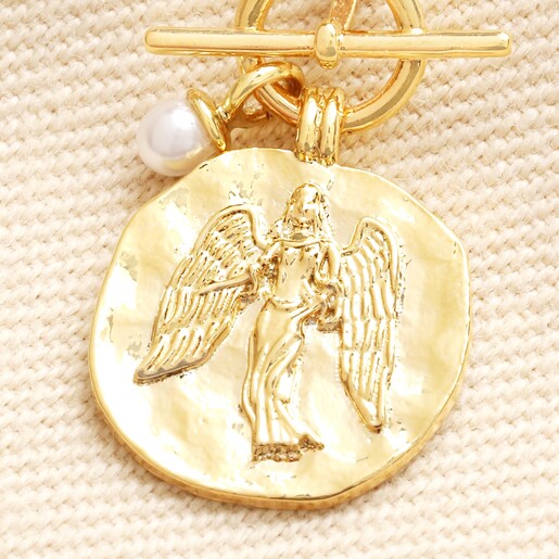 Close up of T-Bar Angel Coin Pendant Necklace in Gold