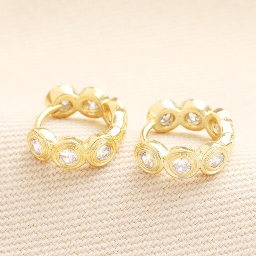 Small Round Crystal Huggie Hoop Earrings in Gold