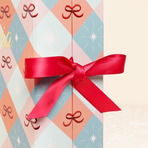 Close Up of Personalised Fill Your Own Christmas Bow Paper Advent