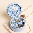 Open view of jewellery case with floral interior