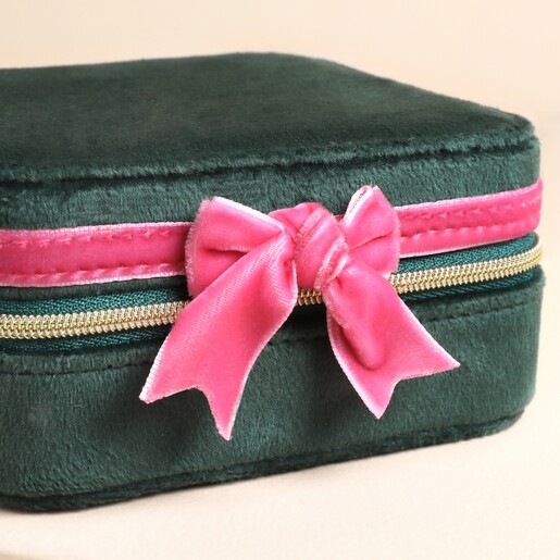 Close up of Green and Pink Velvet Bow Square Travel Jewellery Case with bright pink bow