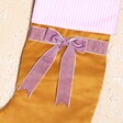 Close up of Mustard and Lilac Velvet Bow Stocking