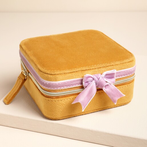 Pink Bow Mustard Square Travel Jewellery Case on a neutral background