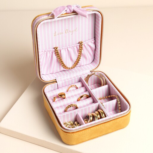 Open case with jewellery inside compartments