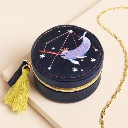 Navy Narwhal Spirit Animal Velvet Round Travel Jewellery Case on a neutral background