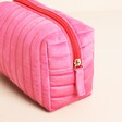 Side of washbag with zipper detail
