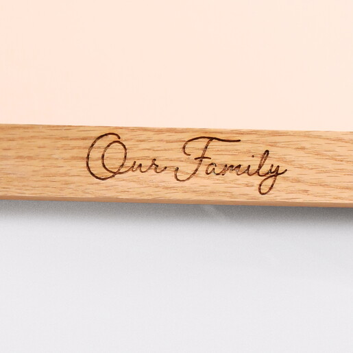 close up of 'our family' engraving
