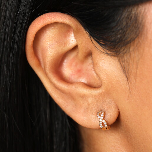 Crystal Infinity Huggie Hoop Earrings in Gold