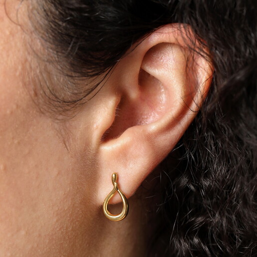 Model shot of Stainless Steel Infinity Stud Earrings in Gold