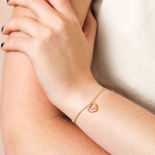 Sterling Silver Interlocking Crystal Heart Charm Bracelet in Gold