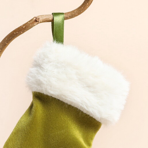 Close Up of Mini Green Velvet Stocking Hanging Decoration
