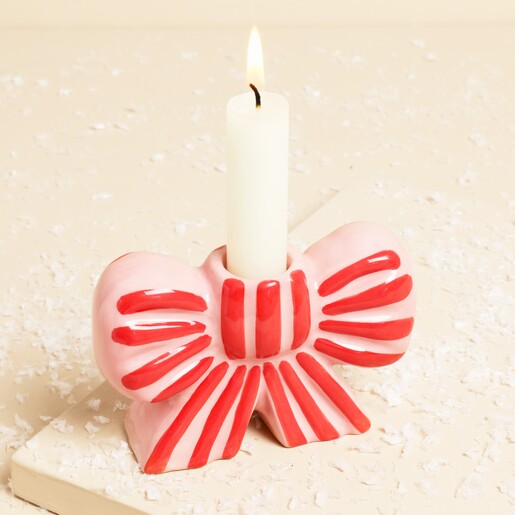 Pink and Red Stripe Bow Ceramic Candle Holder on a neutral background
