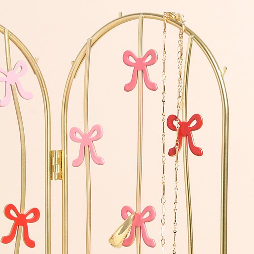 Close Up of Pink and Red Bow Metal Folding Jewellery Stand
