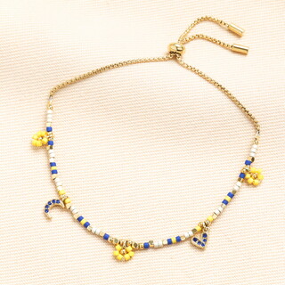 Stainless Steel Blue and Yellow Beaded Bracelet in Gold