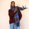 Model Wearing Blue and Brown Tartan Winter Scarf