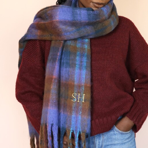 Close Up of Model Wearing Scarf Close Up of Model Wearing Personalised Blue and Brown Tartan Winter Scarf