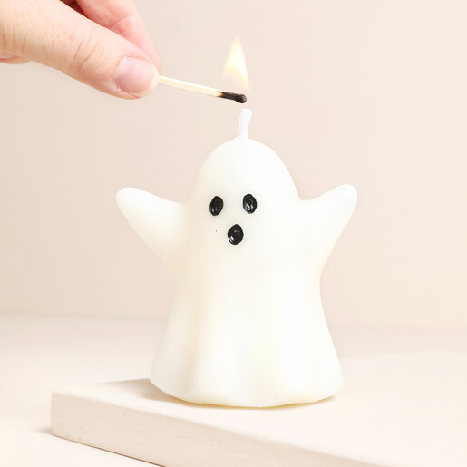 Something Different Sweet Ghost Shaped Candle being lit