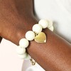 Cream Chunky Beaded Heart Charm Bracelet in Gold on Model