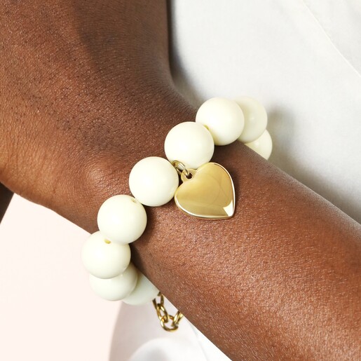 Cream Chunky Beaded Heart Charm Bracelet in Gold on Model