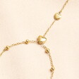 Stainless Steel Heart Charm Hand Chain in Gold Close Up