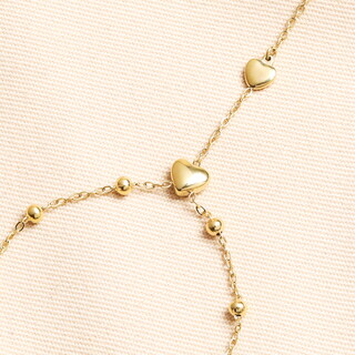 Stainless Steel Heart Charm Hand Chain in Gold