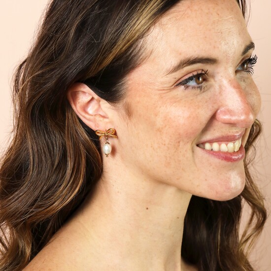 Stainless Steel Bow Pearl Drop Earrings in Gold