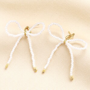 Stainless Steel Pearl Bow Stud Earrings in Gold