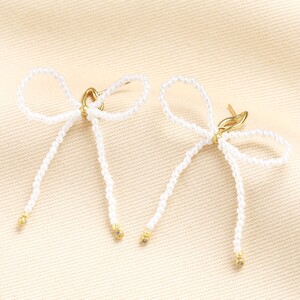 String Pearl Bow Stud Earrings in Gold