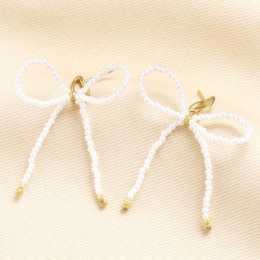 Stainless Steel Pearl Bow Stud Earrings in Gold