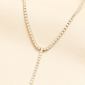 Stainless Steel Crystal Lariat Necklace in Gold