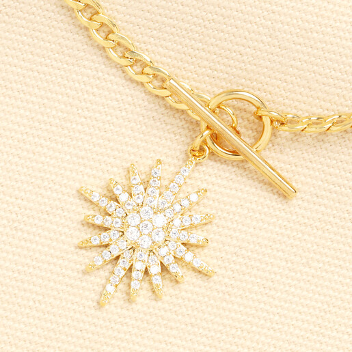 Close up of sparkling cubic zirconia star charm and toggle clasp